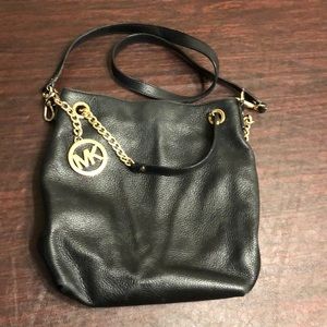 Michael Kors authentic black leather purse.